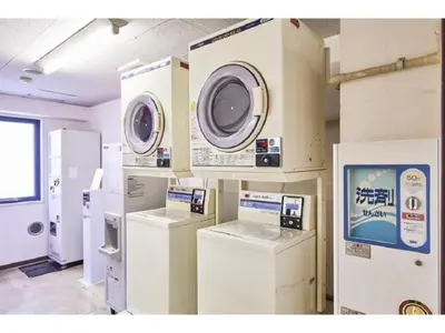 a room with several washing machines and appliances at Urayasu Sun Hotel - Vacation STAY 32992v in Urayasu