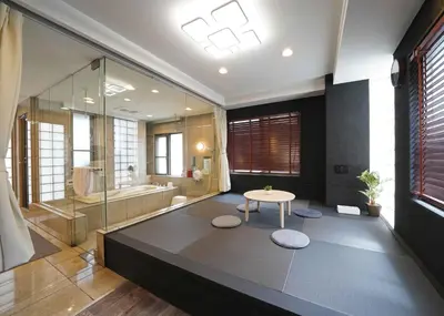a bathroom with a shower and a table and a tub at \u9f8d\u99ac\u30b6\u30bf\u30ef\u30fc RYUMA The TOWER \u4e00\u68df\u8cb8\u5207\u306e\u5bbf in Tokyo