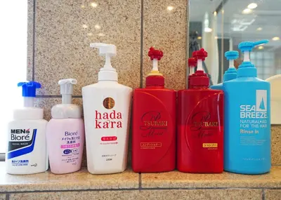 a group of four bottles of soap and shampoo on a counter at \u9f8d\u99ac\u30b6\u30bf\u30ef\u30fc RYUMA The TOWER \u4e00\u68df\u8cb8\u5207\u306e\u5bbf in Tokyo
