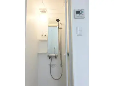 a shower in a bathroom with a mirror at KIKO HOUSE - Vacation STAY 42460v in Tokyo