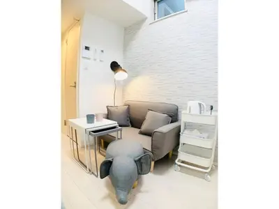 a living room with a couch and a table at KIKO HOUSE - Vacation STAY 42470v in Tokyo