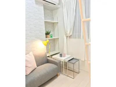 a living room with a couch and a table at KIKO HOUSE - Vacation STAY 42467v in Tokyo