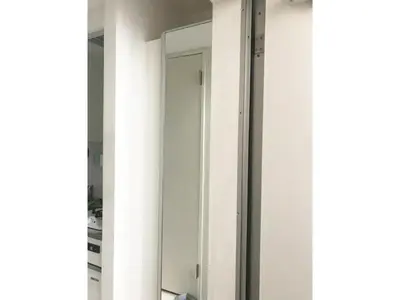 a glass wardrobe in a white room at KIKO HOUSE - Vacation STAY 42456v in Tokyo