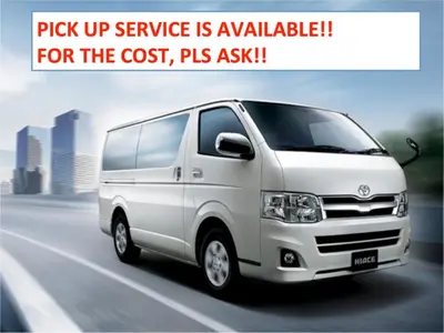 a white van driving down a road with the words pick up service is available for at Gracias Shibuya Honmachi - Vacation STAY 81716v in Tokyo