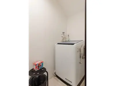 a small white refrigerator in a room at Gracias Shibuya Honmachi - Vacation STAY 81716v in Tokyo