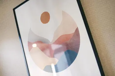 a framed picture of a flower on a wall at \u3077\u3075\u304b\u5c0f\u6885 in Tokyo