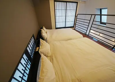 two beds sitting on top of a balcony at Ryoma THE TOWER - Vacation STAY 12892 in Tokyo