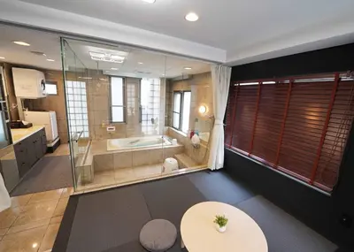 a large bathroom with a tub and a table at Ryoma THE TOWER - Vacation STAY 12892 in Tokyo