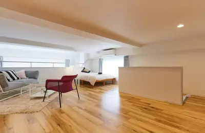a living room with a couch and a bed at HOTEL ESTASIA Ryogoku - Vacation STAY 53008v in Tokyo