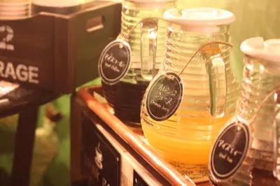 a group of jars of honey on a shelf at Hotel OLDSWING Adult Only in Tokyo