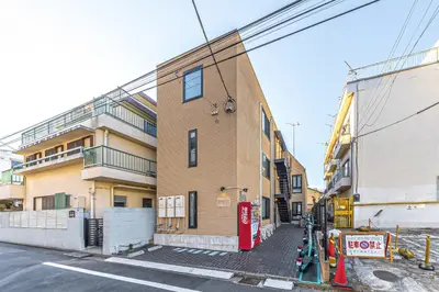 a building on the side of a street at 15 min Shinjuku ! Kitchen,Laundry! Perfect for a Long Stay I many facilities nearby I Shinjuku,Tokyo in Tokyo