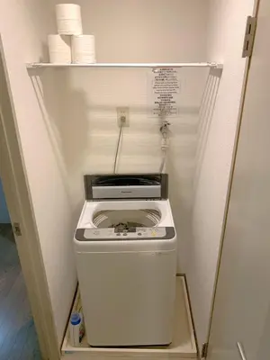 a washer and dryer in a small refrigerator at \u30b0\u30e9\u30f3\u30c7\u30a3\u30aa\u30fc\u30bd\u4e2d\u91ce\u5bcc\u58eb\u898b\u753a in Tokyo