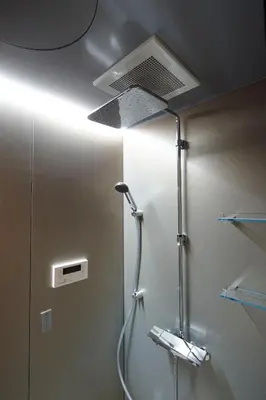 a shower in a bathroom with a ceiling at COCOSHUKU AKASAKA Premium in Tokyo