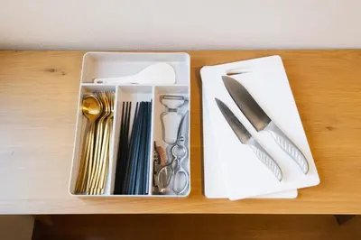 a tray with utensils sitting on a table at Near Ikebukuro, Kitchen & Laundry, Fast Wi-Fi, 4min to Station,Many restaurants nearby!! in Tokyo