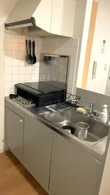a kitchen with a sink and a counter top at Green House Nakano Fujimicho - Vacation STAY 65981v in Tokyo