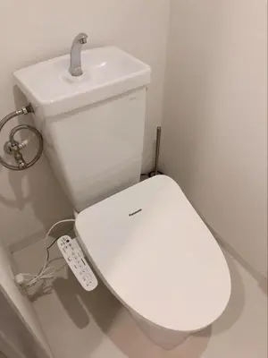a bathroom with a white toilet and a sink at Green House Nakano Fujimicho - Vacation STAY 65992v in Tokyo