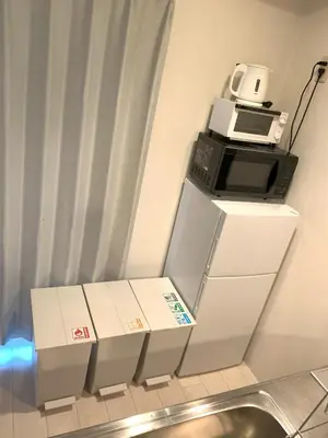 an office with a printer on top of a counter at Green House Nakano Fujimicho - Vacation STAY 65988v in Tokyo