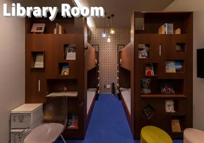 a room with a hallway with a library room at COCOSHUKU Shinjuku-Hanazono in Tokyo