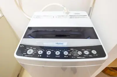a electronic device sitting on top of a table at \u7530\u7aef\u6c11\u6cca\u30fc\u7530\u7aef\u30cf\u30a6\u30b9 in Tokyo