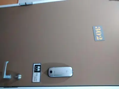a close up of a laptop computer with a remote control at Hitoyado Ryokan Higashiueno - Vacation STAY 72558v in Tokyo