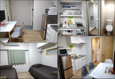 a kitchen and a room with a refrigerator and a table at Hitoyado Ryokan Higashiueno - Vacation STAY 72541v in Tokyo