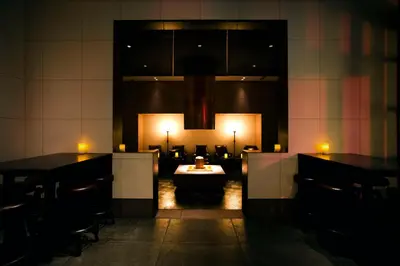 a restaurant with tables and a sink in a room at Andaz Tokyo - A Concept by Hyatt in Tokyo