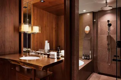 a bathroom with two sinks and a shower at Andaz Tokyo - A Concept by Hyatt in Tokyo