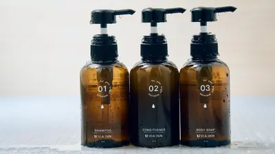 a group of three bottles sitting next to each other at Via Inn Shinjuku in Tokyo