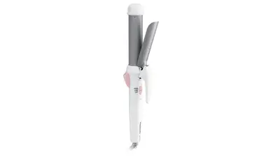 a white toothbrush isolated on a white background at Via Inn Iidabashi Korakuen in Tokyo