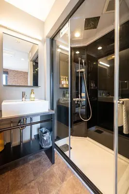 a bathroom with a sink and a shower at HOTEL TABARD TOKYO - Vacation STAY 64544v in Tokyo