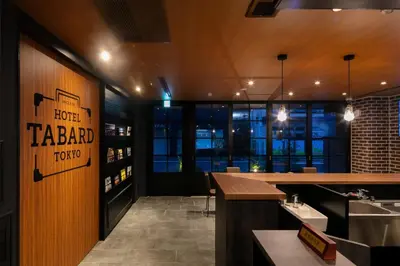 a restaurant with a bar and a kitchen with a sink at HOTEL TABARD TOKYO - Vacation STAY 64544v in Tokyo