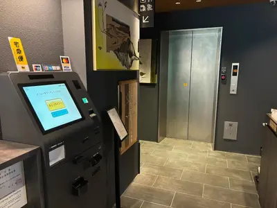 an office with a machine with a screen on it at HOTEL TABARD TOKYO - Vacation STAY 64544v in Tokyo
