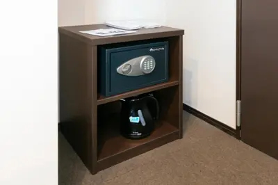 a room with a tv and a coffee maker in a room at HOTEL TABARD TOKYO - Vacation STAY 64544v in Tokyo