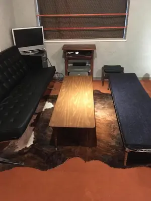 a living room with a couch and a coffee table at ABURA HAUS - Vacation STAY 13195 in Tokyo