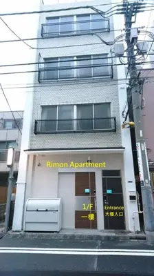 a building on the side of a street at Ichijuku Ryokan Kaminarimon - Vacation STAY 75803v in Tokyo