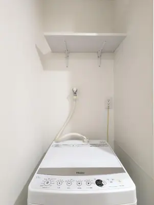 a kitchen with a white stove in a room at japan house itabashi in Tokyo