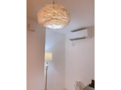 a light fixture hanging from a ceiling in a room at Private Hotel Oshiage - Vacation STAY 81630v in Tokyo