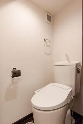 a bathroom with a white toilet in a room at Asakusa SAKURA-RYOKAN - Vacation STAY 88198v in Tokyo