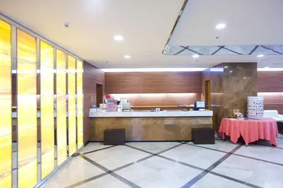 a restaurant with a table and a counter in a room at Pearl Hotel Kayabacho in Tokyo