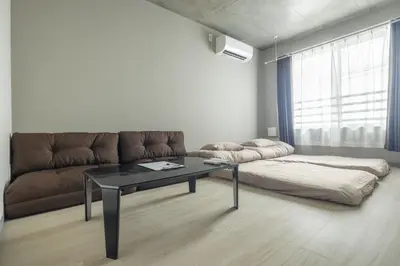 a living room with a couch and a table at Marvelous Koiwa - Vacation STAY 90814v in Tokyo