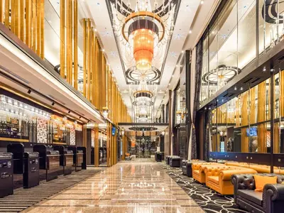 a shopping mall with couches and a chandelier at APA Hotel & Resort Roppongi Ekihigashi in Tokyo