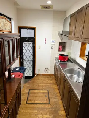 a kitchen with a sink and a counter top at japan house shinkoiwa guest house in Tokyo