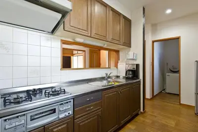 a kitchen with a sink and a counter top at japan house shinkoiwa guest house in Tokyo