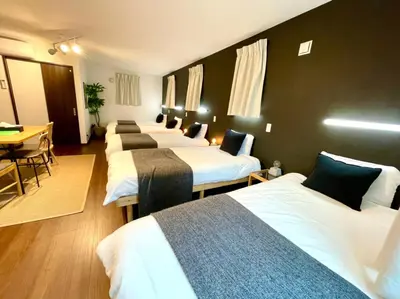 a row of beds in a hotel room at Sumida-ku - House - Vacation STAY 86935v in Tokyo