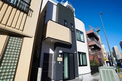a black and white building on a city street at Sumida-ku - House - Vacation STAY 86950v in Tokyo