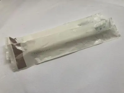 a package of toothpaste on a white background at AN HOTEL in Tokyo