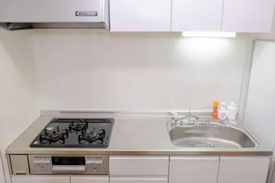 a kitchen with a stove and a sink at Shinjuku area house with 3BR 2mins to Metro on foot in Tokyo