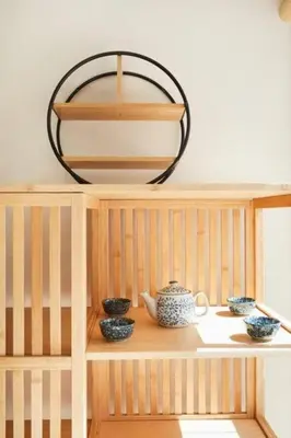 a shelf with a mirror and bowls on it at Shinjuku area house with 3BR 2mins to Metro on foot in Tokyo