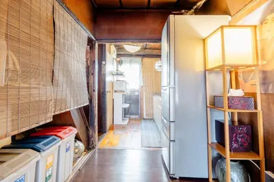 a kitchen with a refrigerator in a room at Konoha house【Japanese-style guest house near Asakusa & Skytree】 in Tokyo
