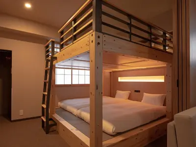 a bedroom with two bunk beds in a room at MIMARU SUITES Tokyo Nihombashi in Tokyo